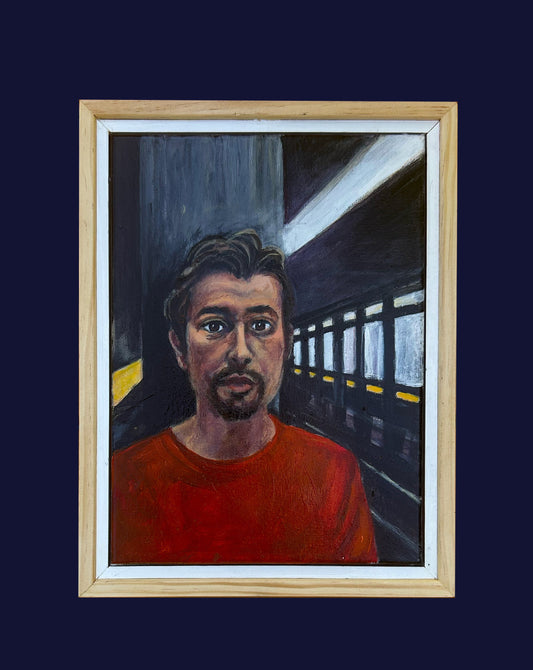 Framed painting of a person in a red shirt on a train platform.